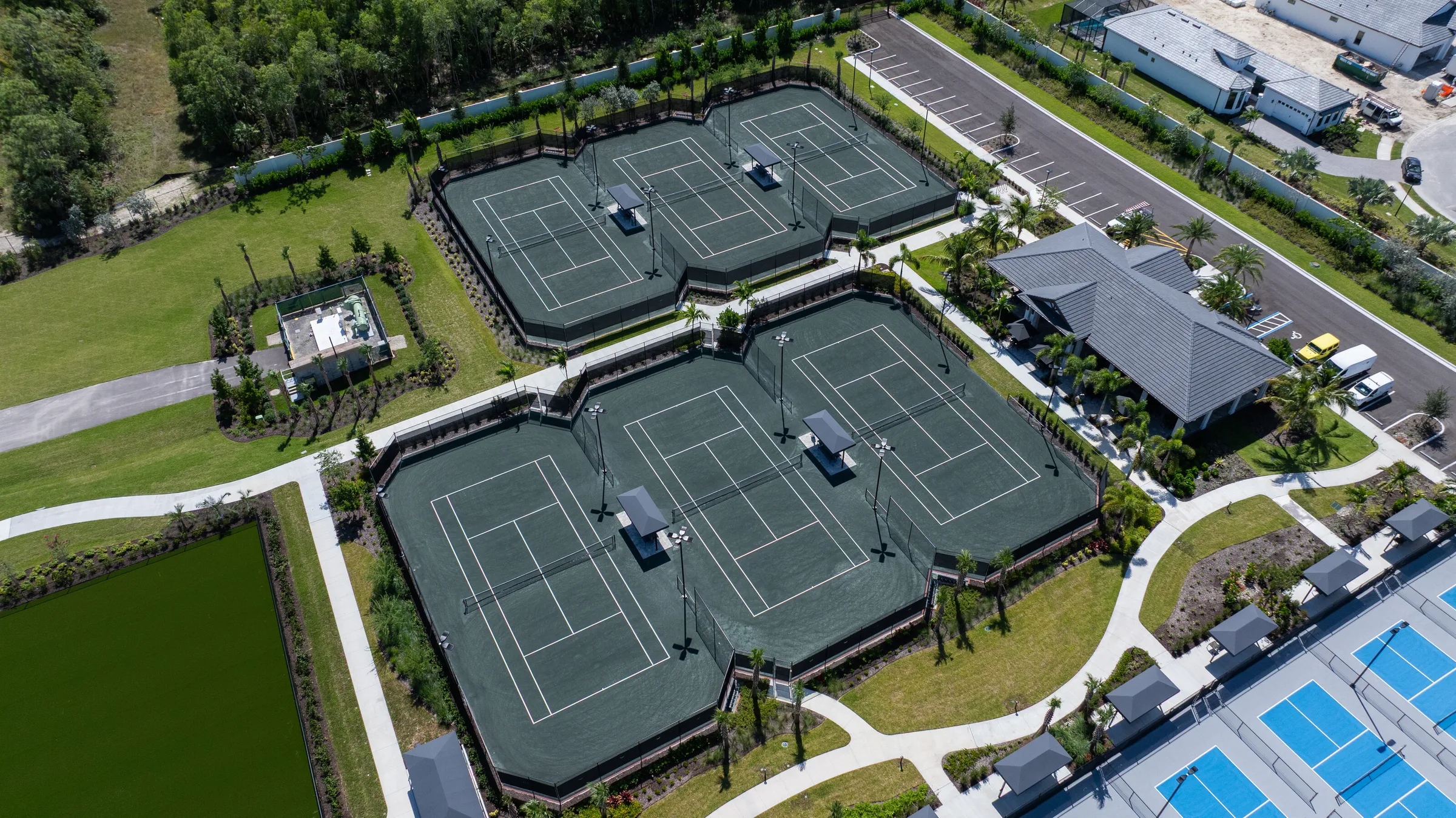 Aerial view of the tennis courts at the Caymas Sports Center, Naples.