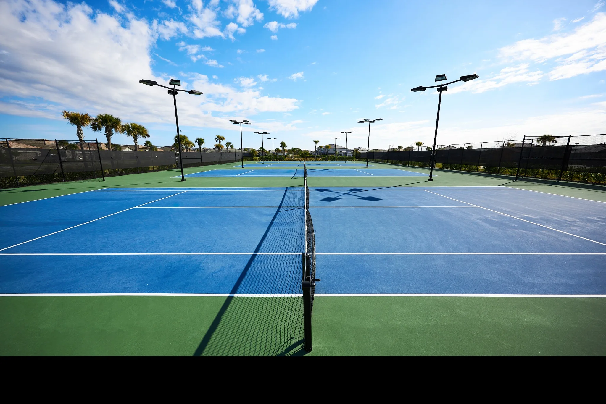 Lighted tennis courts at Timber Creek, Fort Myers (official community site).