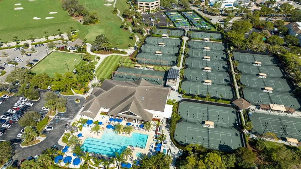Aerial of the tennis center and pool complex at Bonita Bay Club, Bonita Springs (official Bonita Bay Club site).