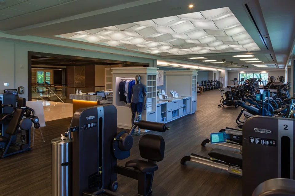 Fitness center with cardio and strength equipment at Bonita Bay Club, Bonita Springs (official Bonita Bay Club site).