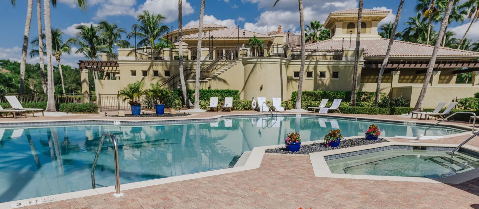 Resort-style pool and clubhouse at The Colony Golf and Country Club (official).