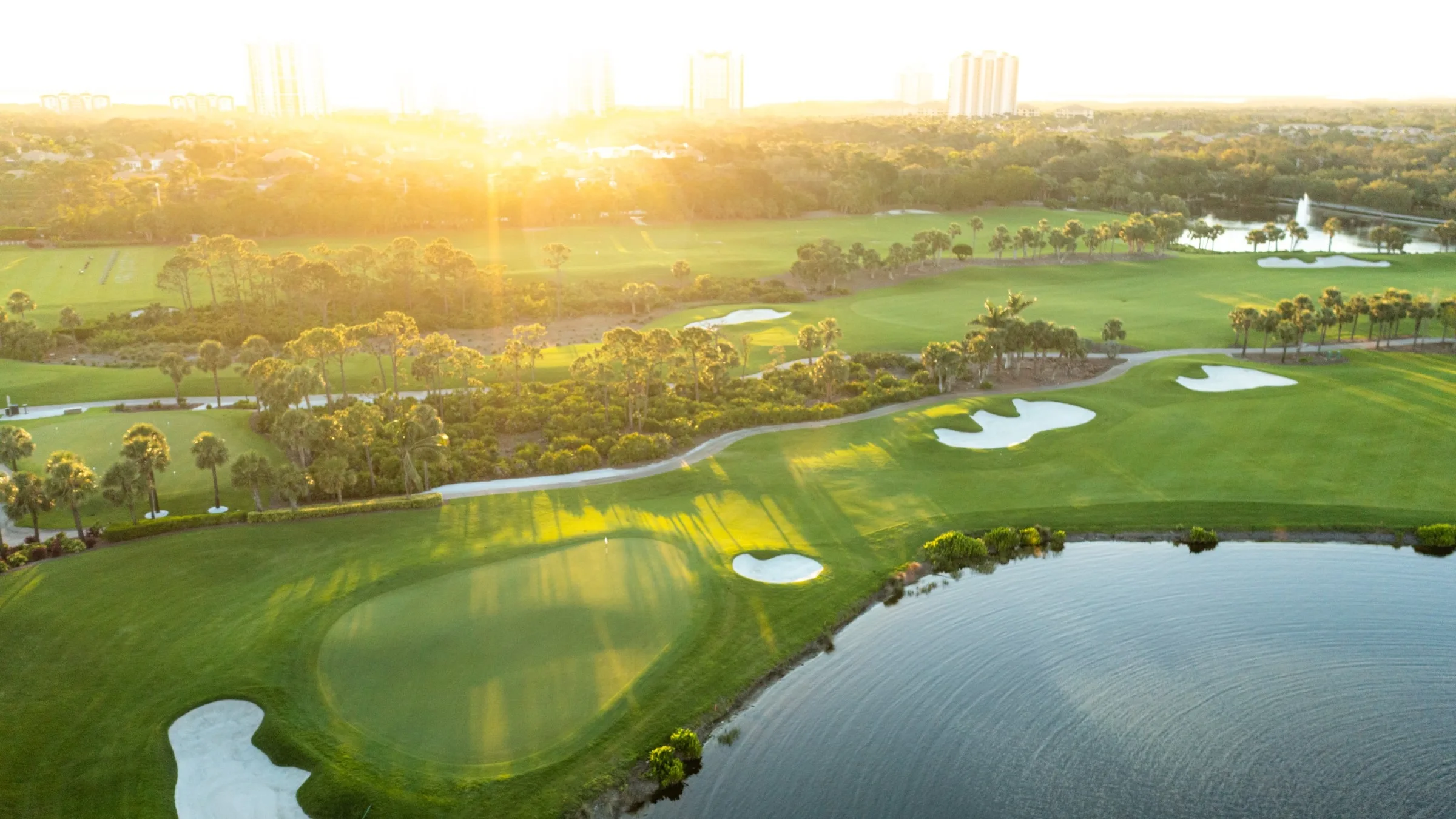 Golf course and lake at sunset, The Colony Golf and Country Club.