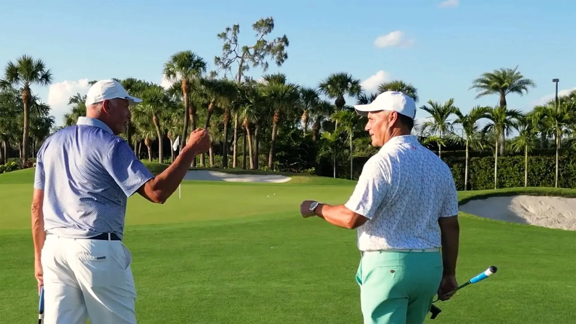 Golfers celebrating on the green at Shadow Wood Country Club at The Brooks, Estero (official).