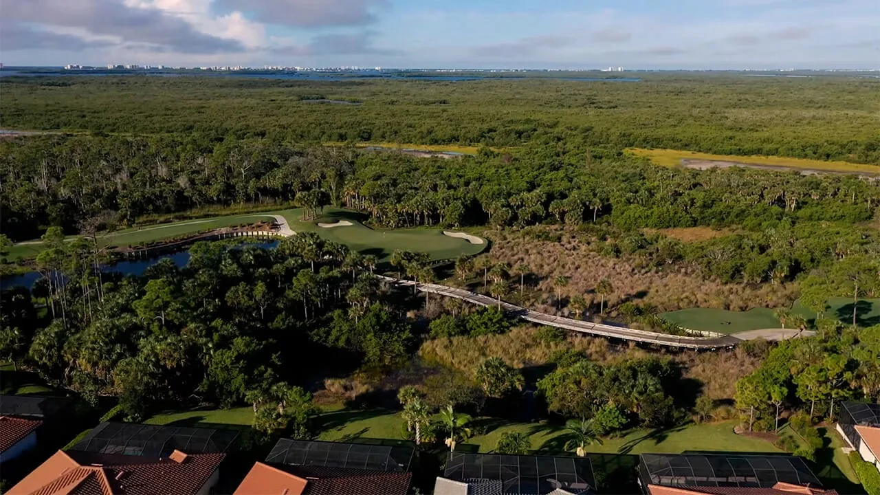 Aerial of preserve land and boardwalk at Shadow Wood, Estero (official club site).
