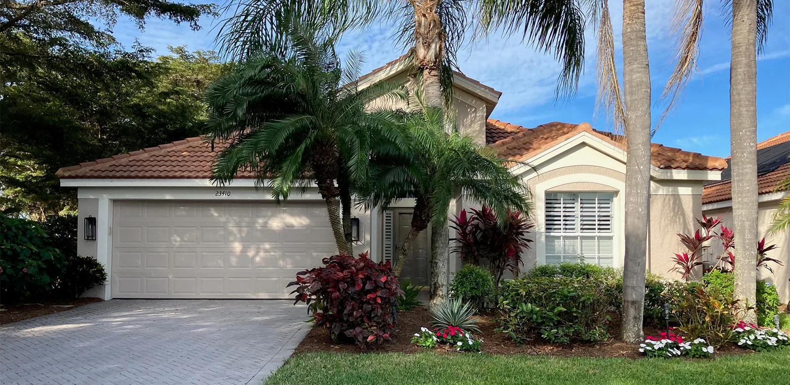 Single-family home streetscape in Copperleaf (official club site).