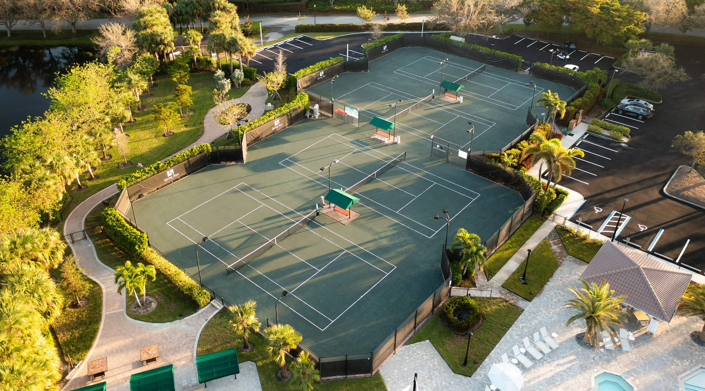 Aerial of the tennis courts at Spring Run, Estero (official club site).