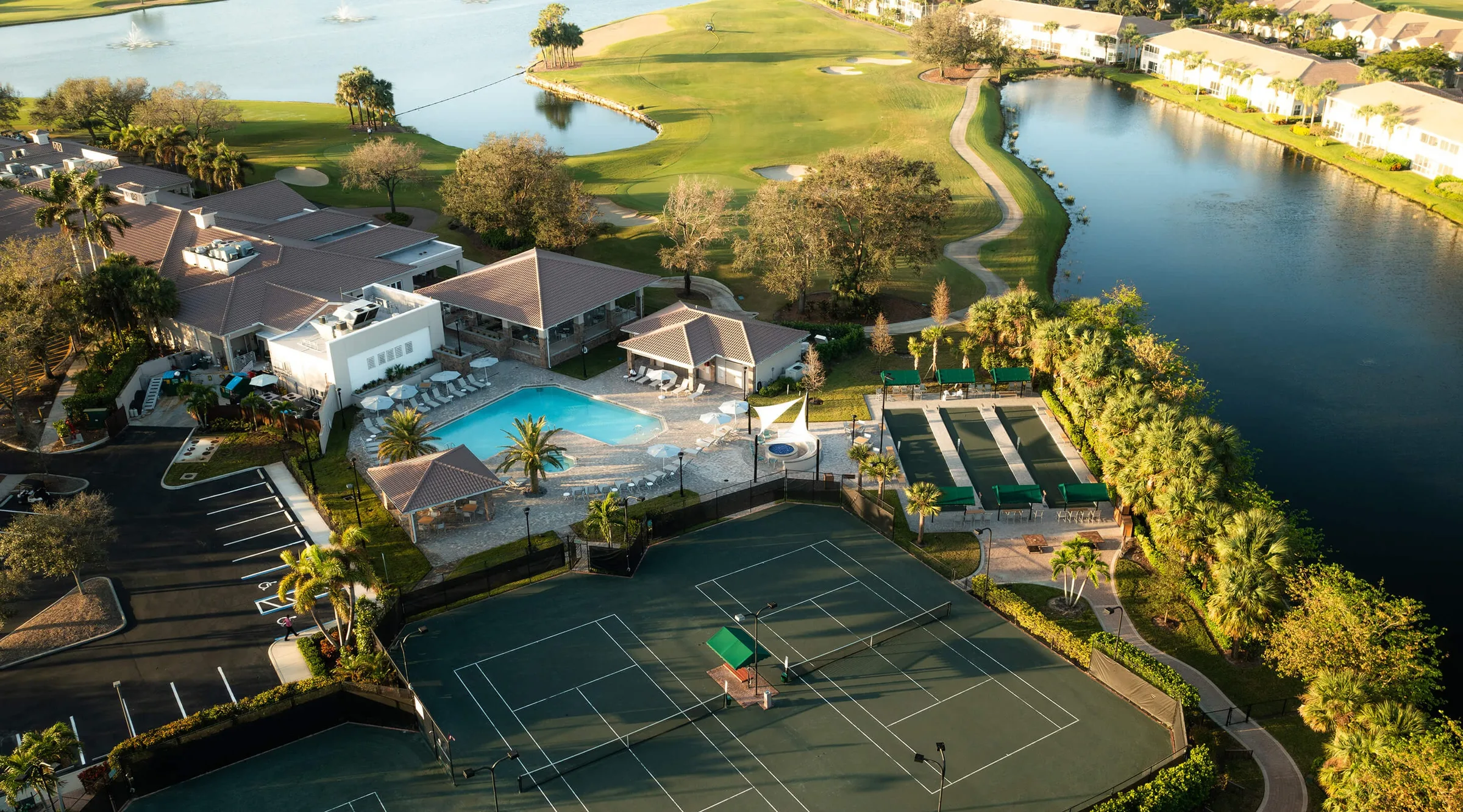 Aerial of the clubhouse, pool and courts at Spring Run, Estero (official club site).