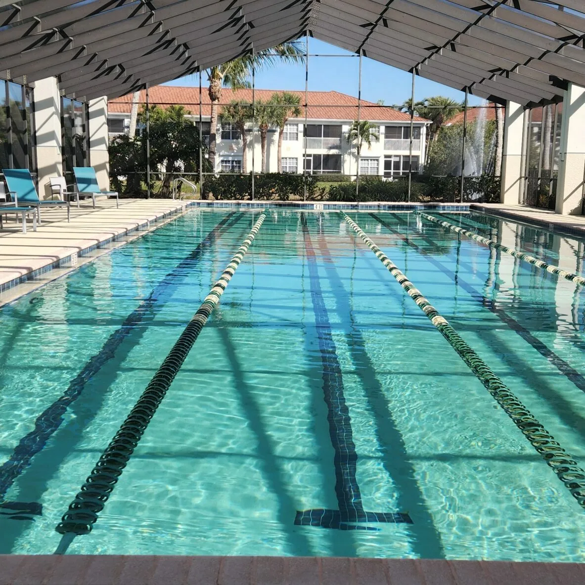 Screened indoor lap pool at Lighthouse Bay (official association).