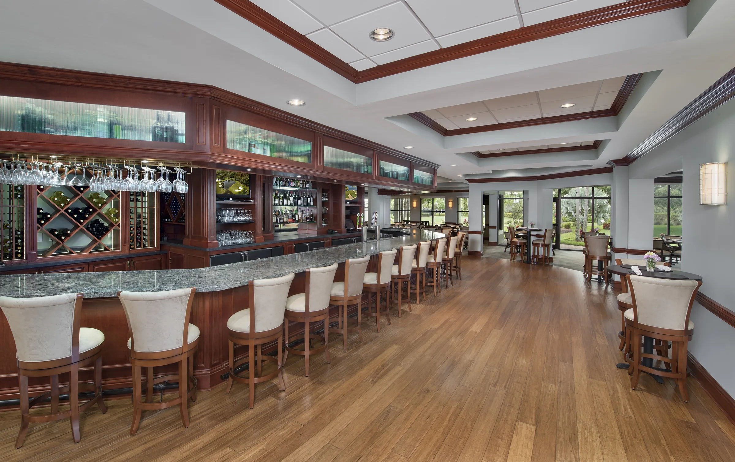 Grille room bar at Highland Woods Golf and Country Club, Bonita Springs (official club site).