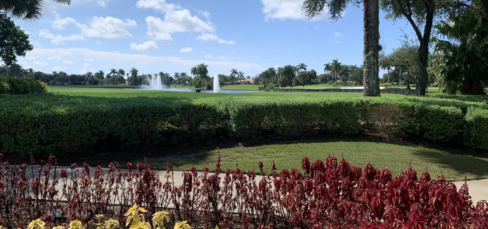 Fountain lake and golf landscape at Palmira Golf and Country Club, Bonita Springs (official).