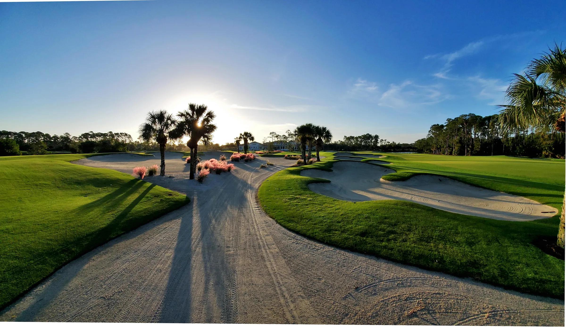 Cart path and fairway at sunrise at The Club at Mediterra, Naples.