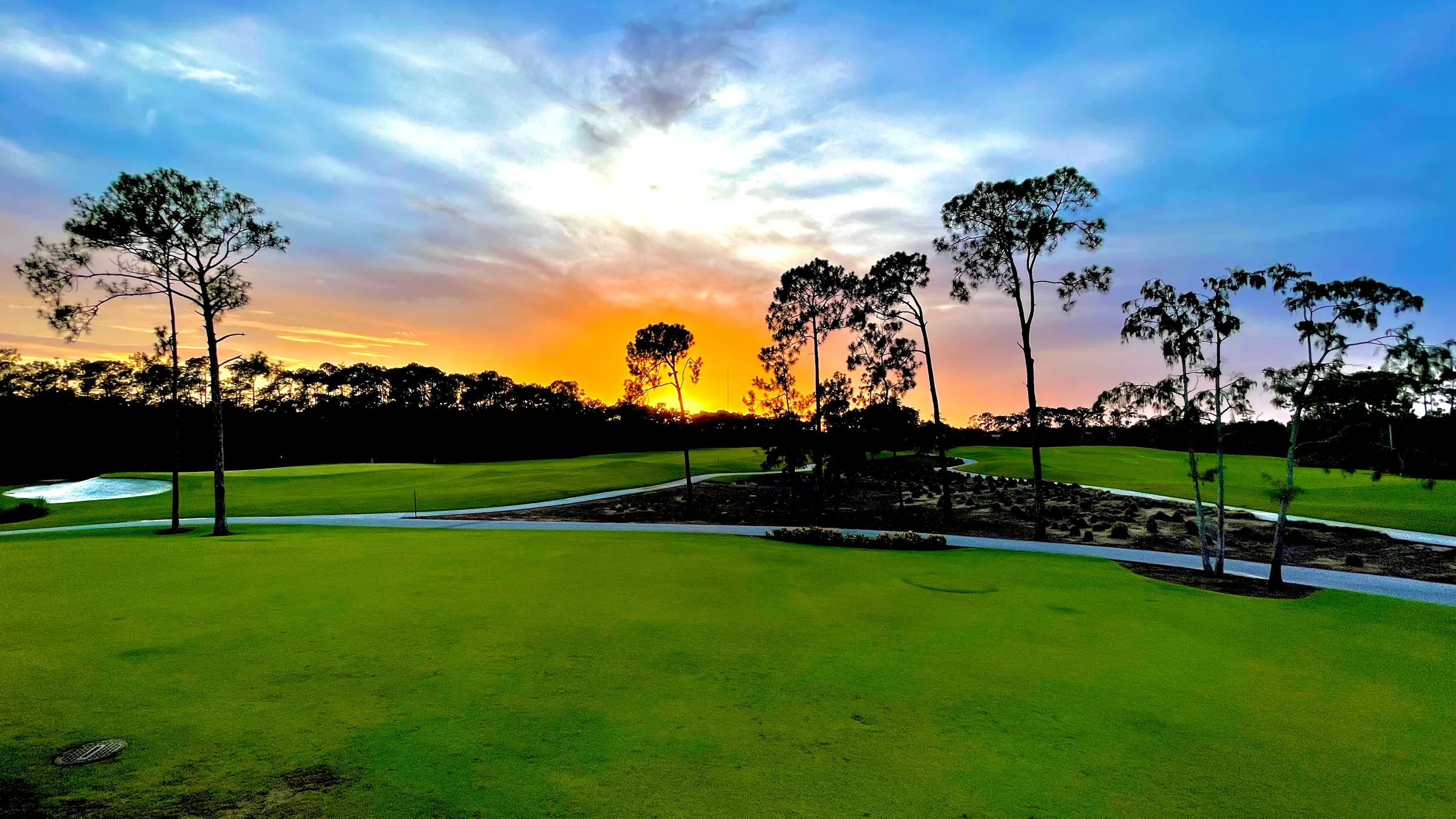Golf course at sunset at The Club at Mediterra, Naples.