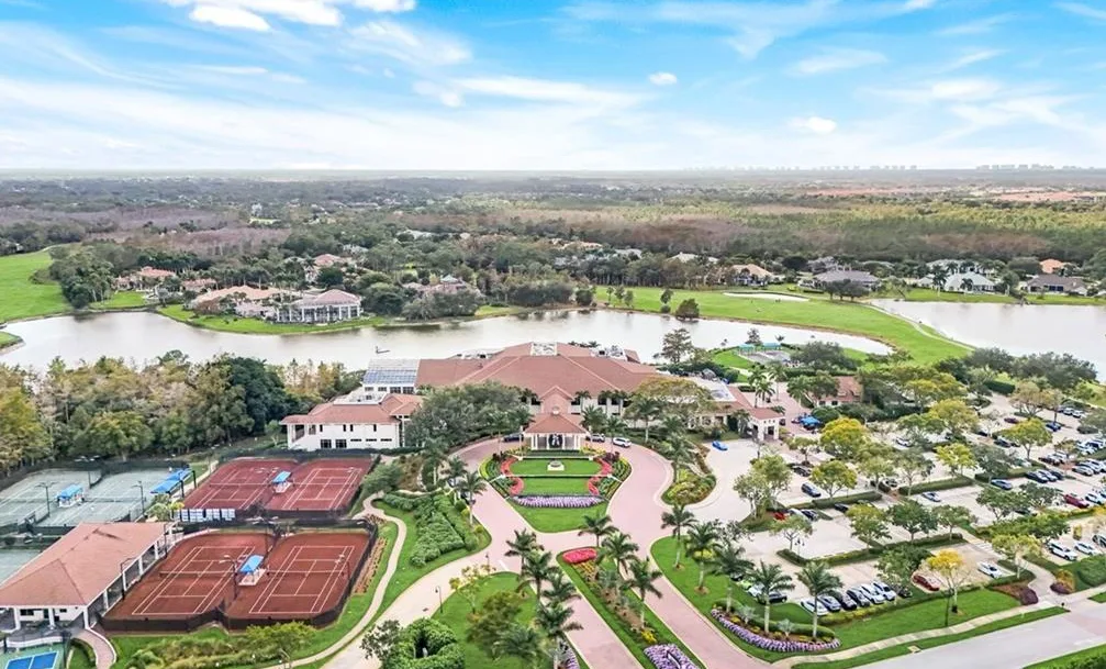 Quail West clubhouse, courts and lakes, aerial view