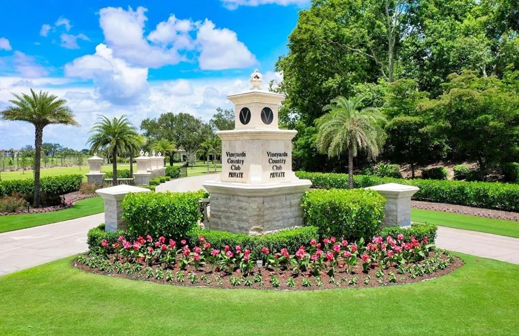 Vineyards Country Club entry monument with landscaped flower bed