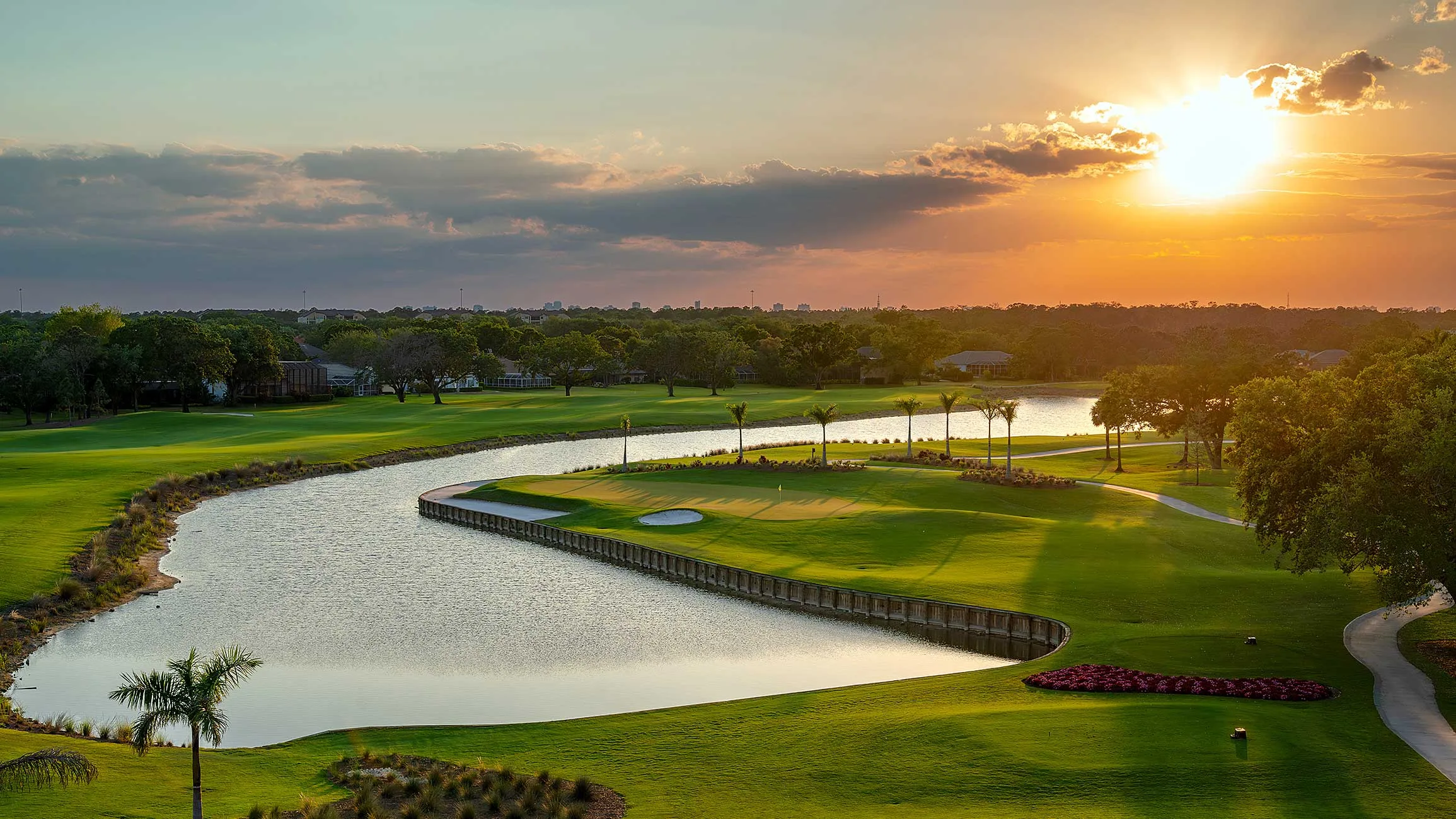 Lakeside golf hole at sunset, Vineyards Country Club, Naples.
