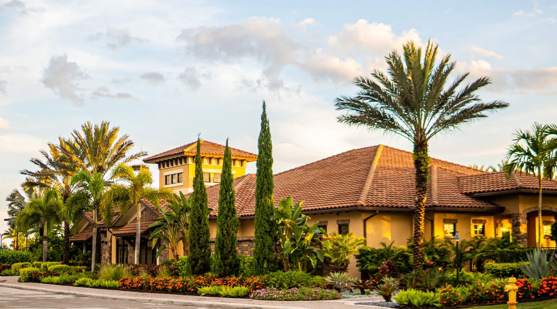 Mediterranean-style clubhouse exterior at Esplanade Golf and Country Club, Naples (official club site).
