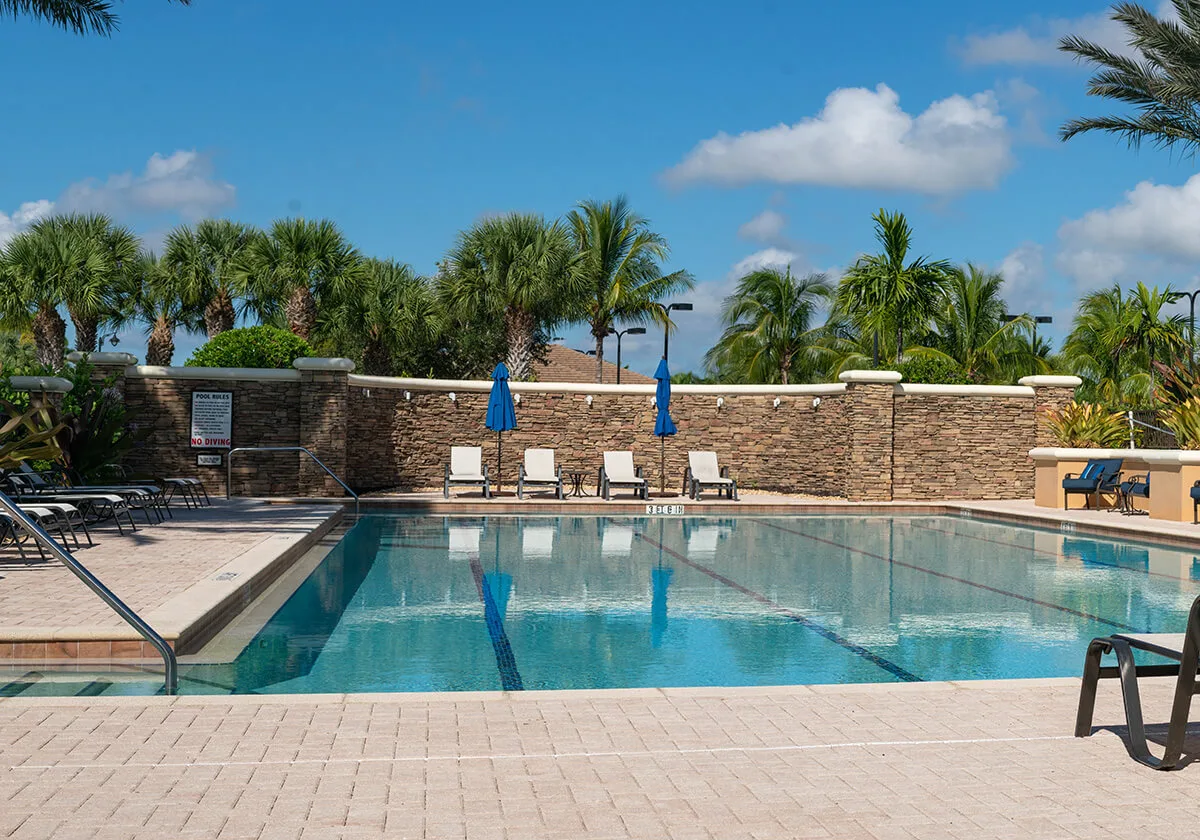 Community pool deck at The Quarry (official club site).