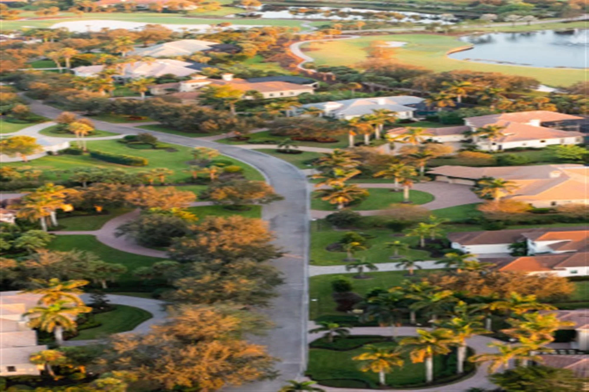 Aerial residences and golf green at TwinEagles Club, Naples (official).
