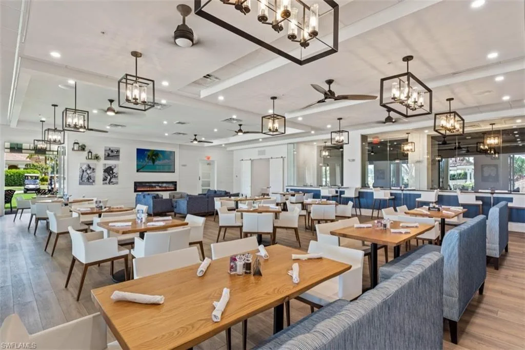 Tavern dining room at The Strand clubhouse, Naples (official club site).
