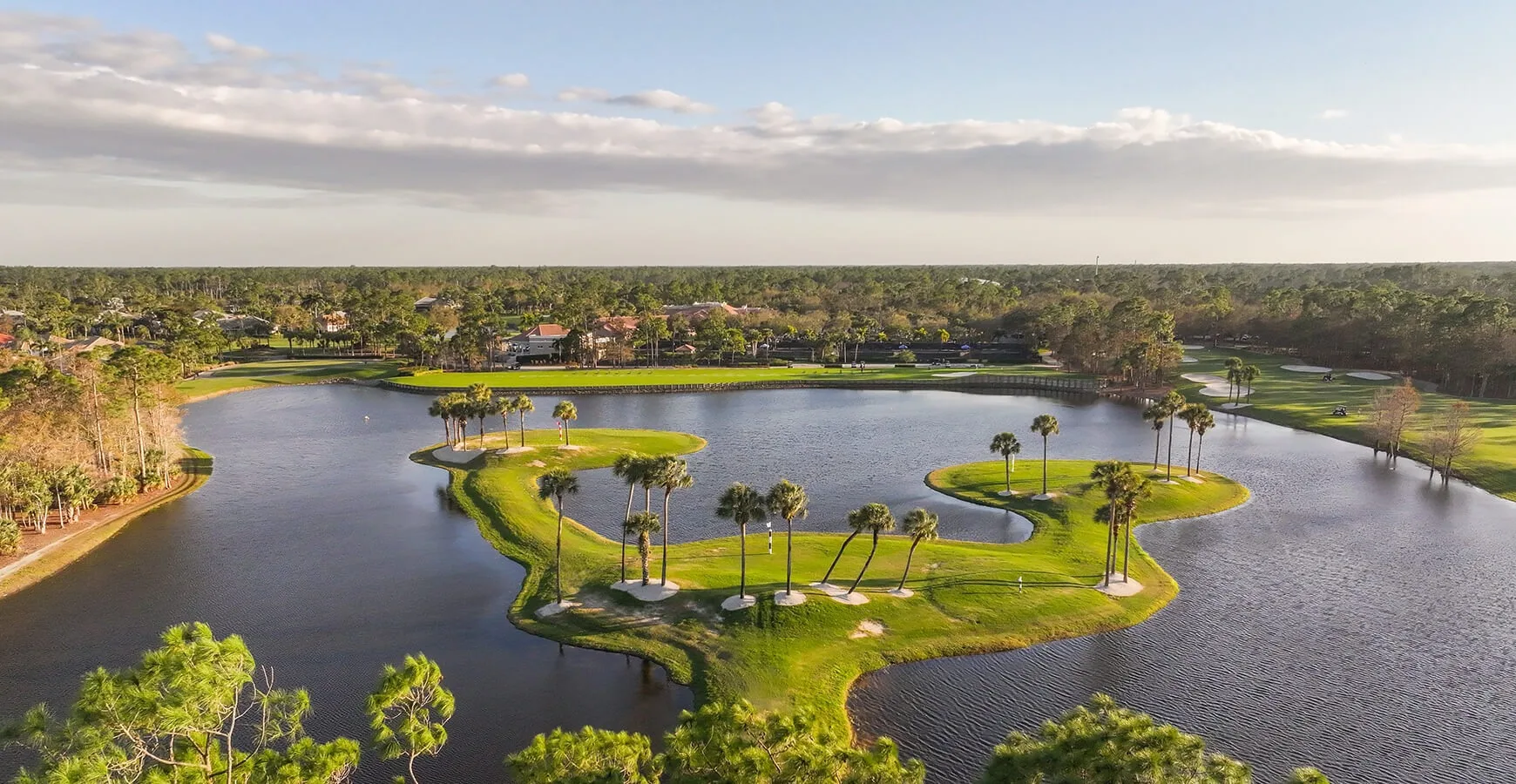 Aerial of the island practice area at Vanderbilt Country Club (official club site).