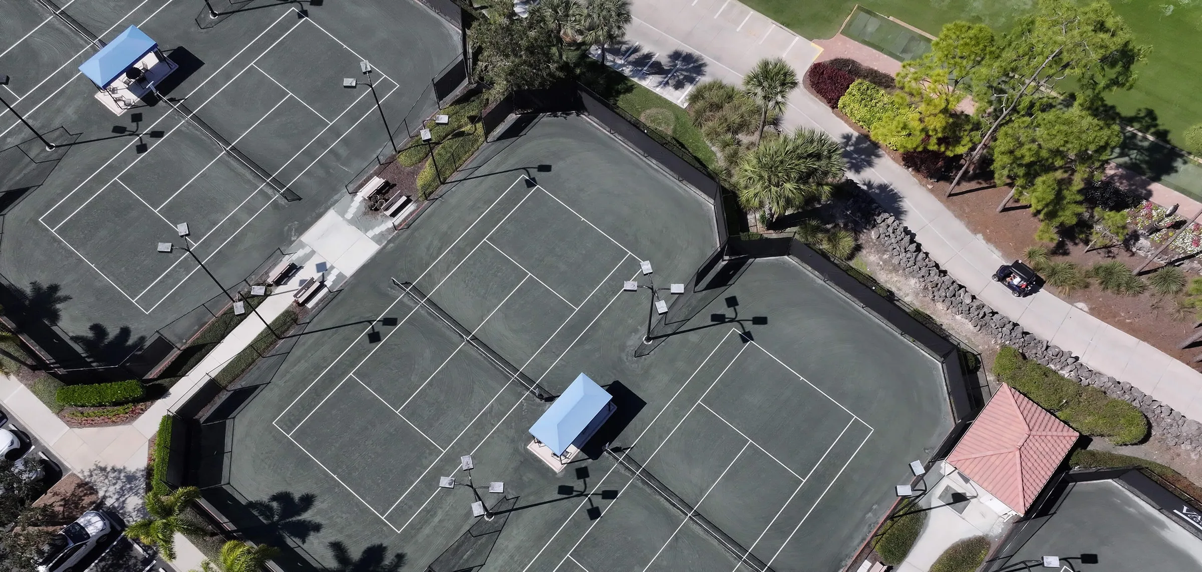 Aerial of the tennis courts at Vanderbilt Country Club, Naples (official club site).