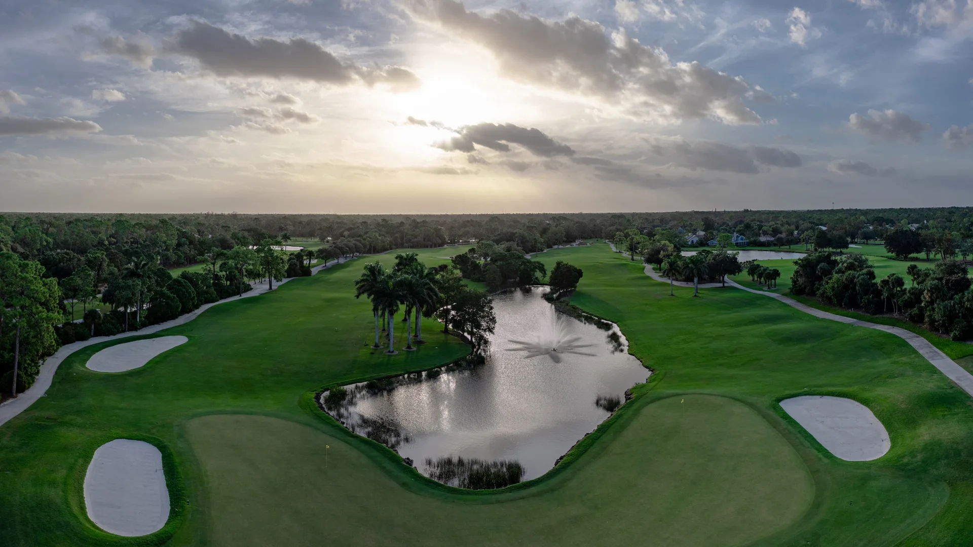 Aerial fairway and fountain at golden hour, Wyndemere Country Club (official).