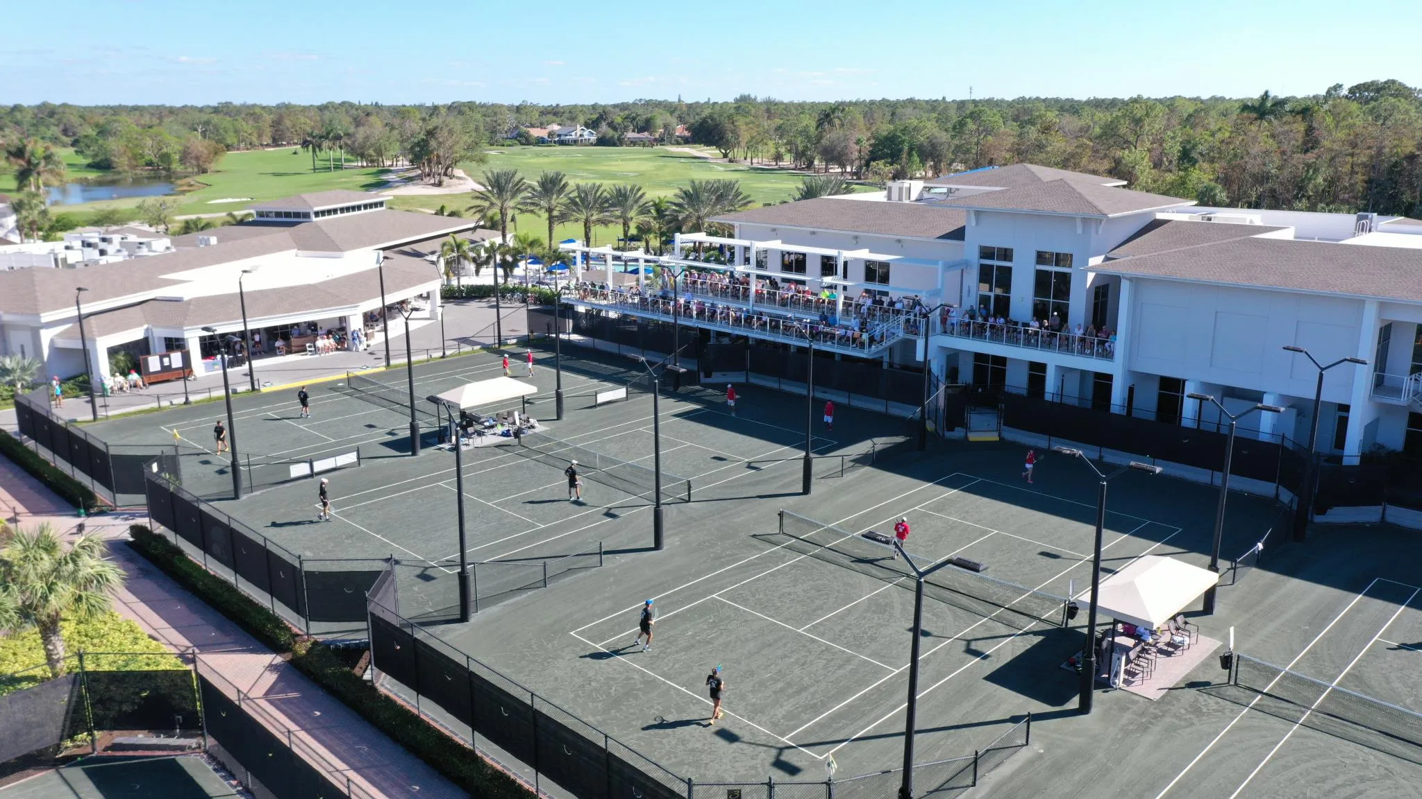 Aerial tennis complex at Wyndemere Country Club, Naples (official).