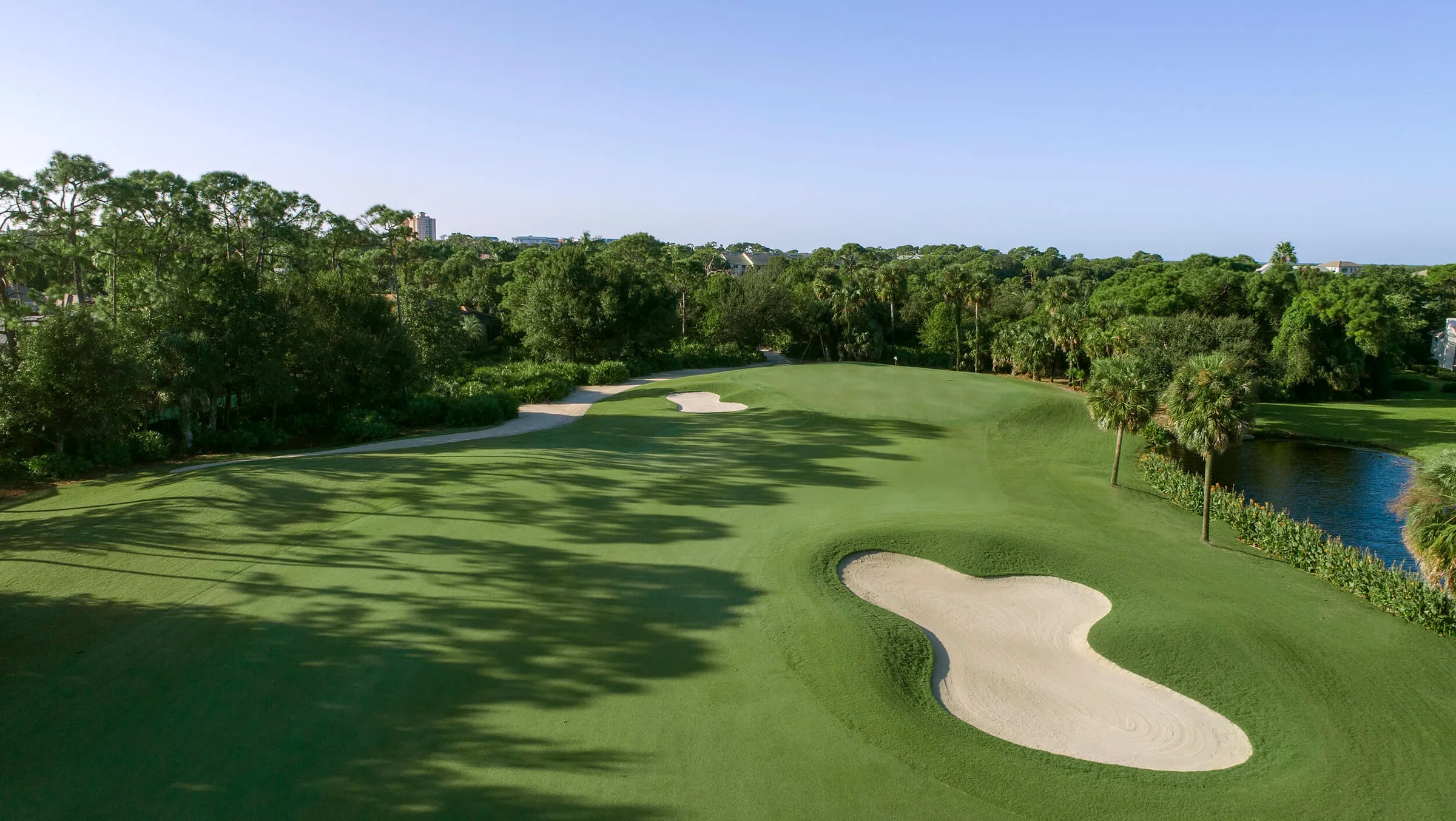 Golf green and bunker on the Audubon course, Naples (official club site).