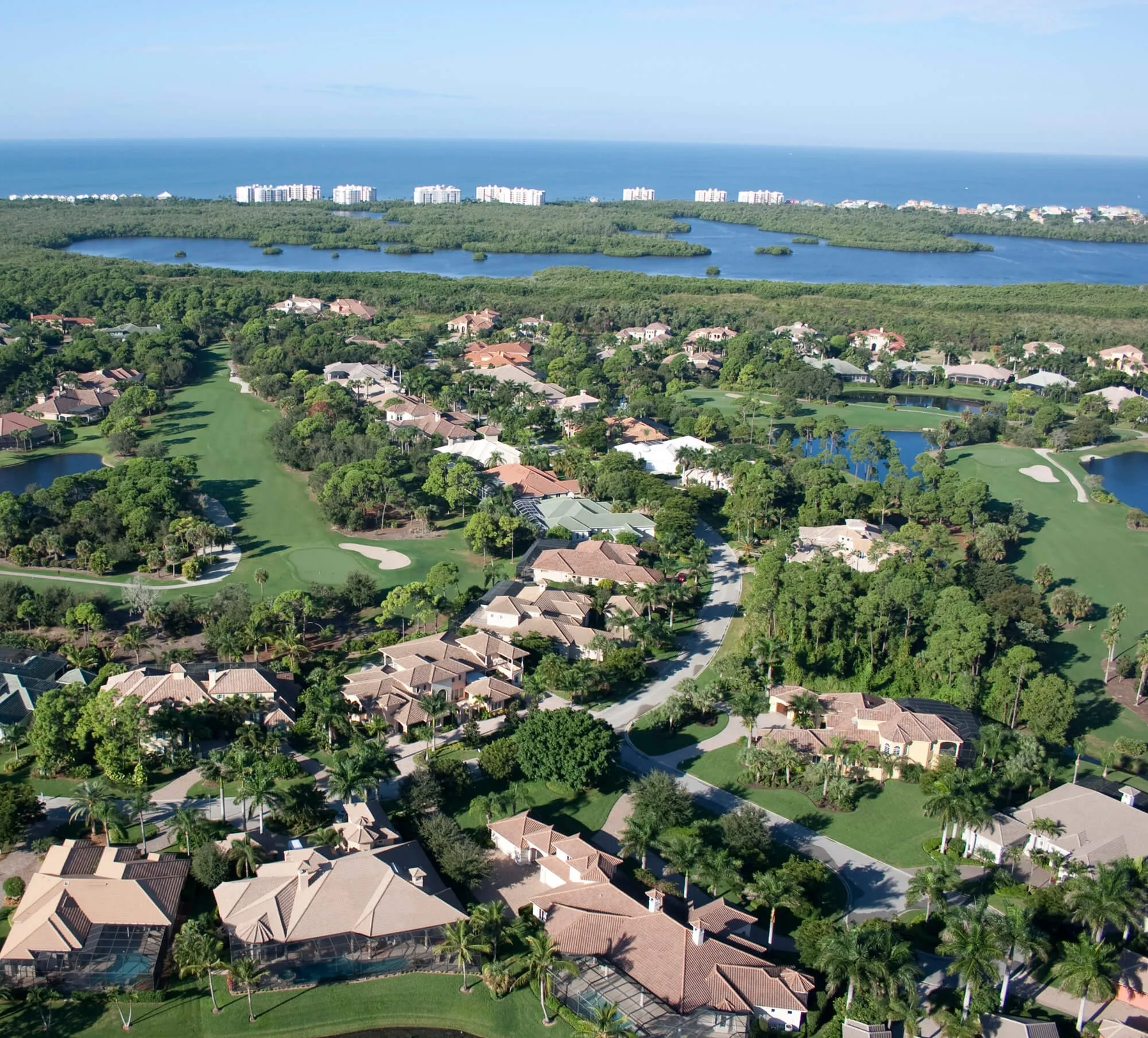 Aerial of Audubon neighborhoods and the Gulf coast, Naples (official club site).