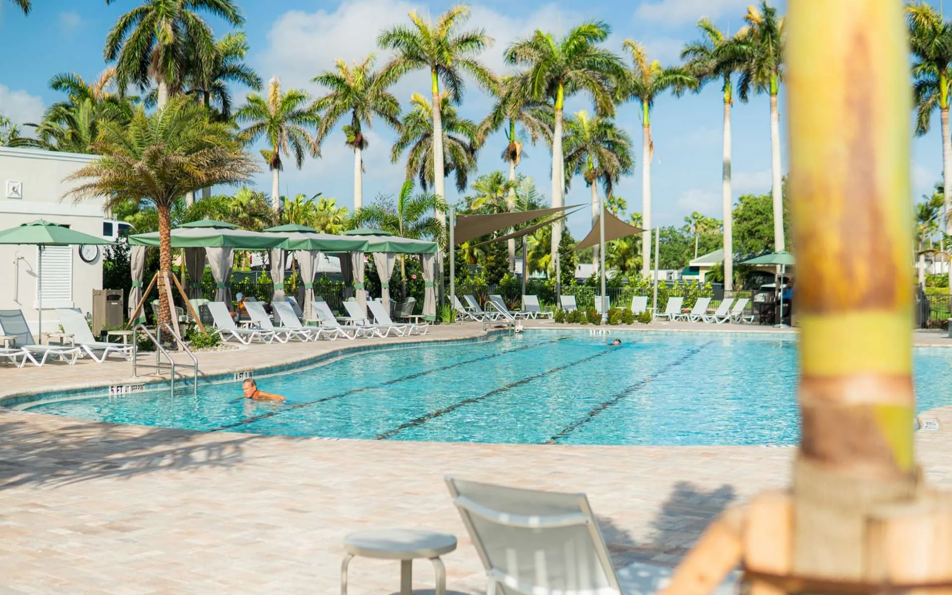 Pool cabanas on the deck at Kensington Golf and Country Club (official).