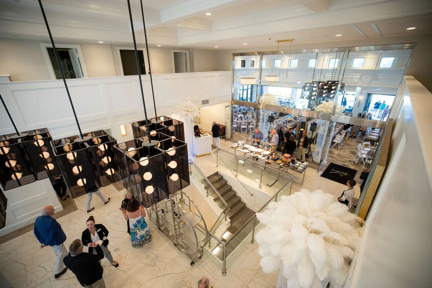 Renovated clubhouse lobby atrium at Kensington Golf and Country Club, Naples (official).