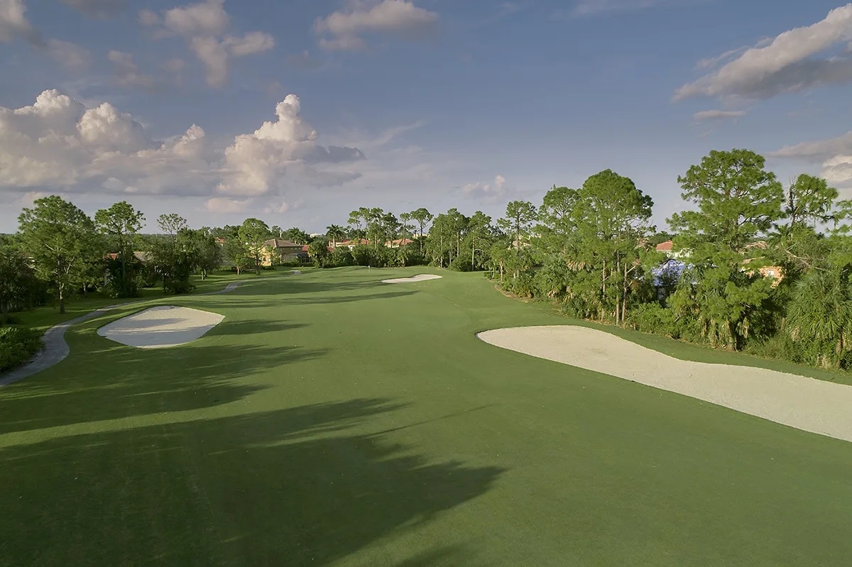 Bunker-lined fairway at Valencia Golf and Country Club, Naples (official club site).