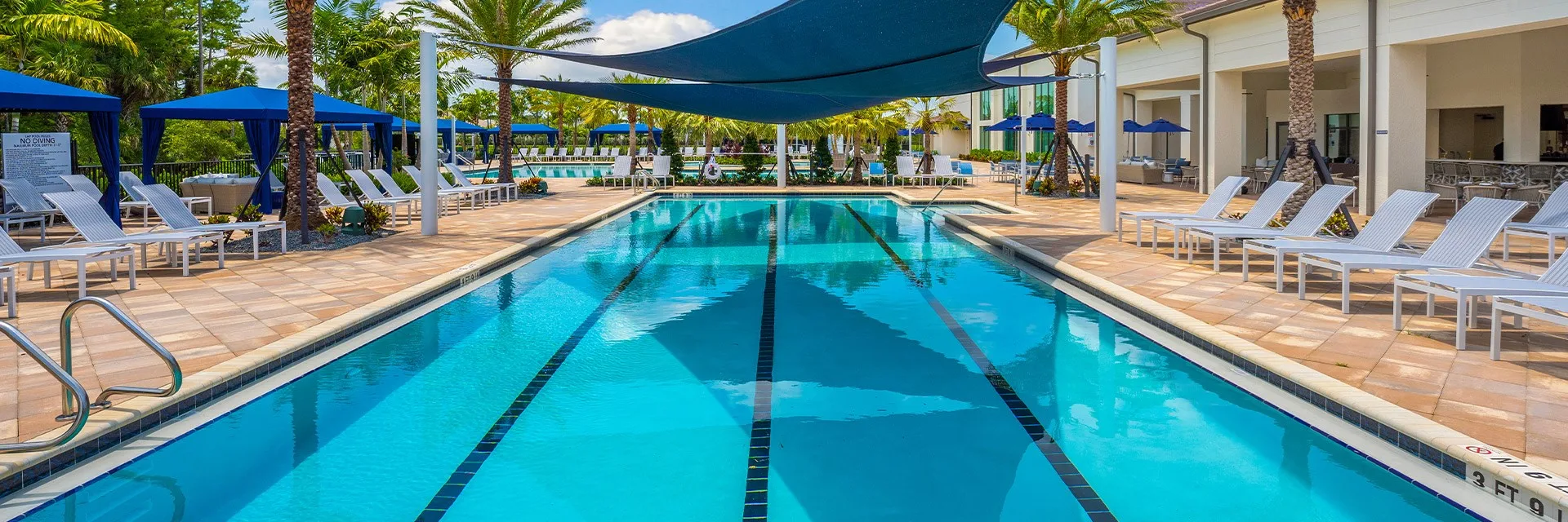 Shaded lap pool at the Valencia Trails clubhouse, Naples.