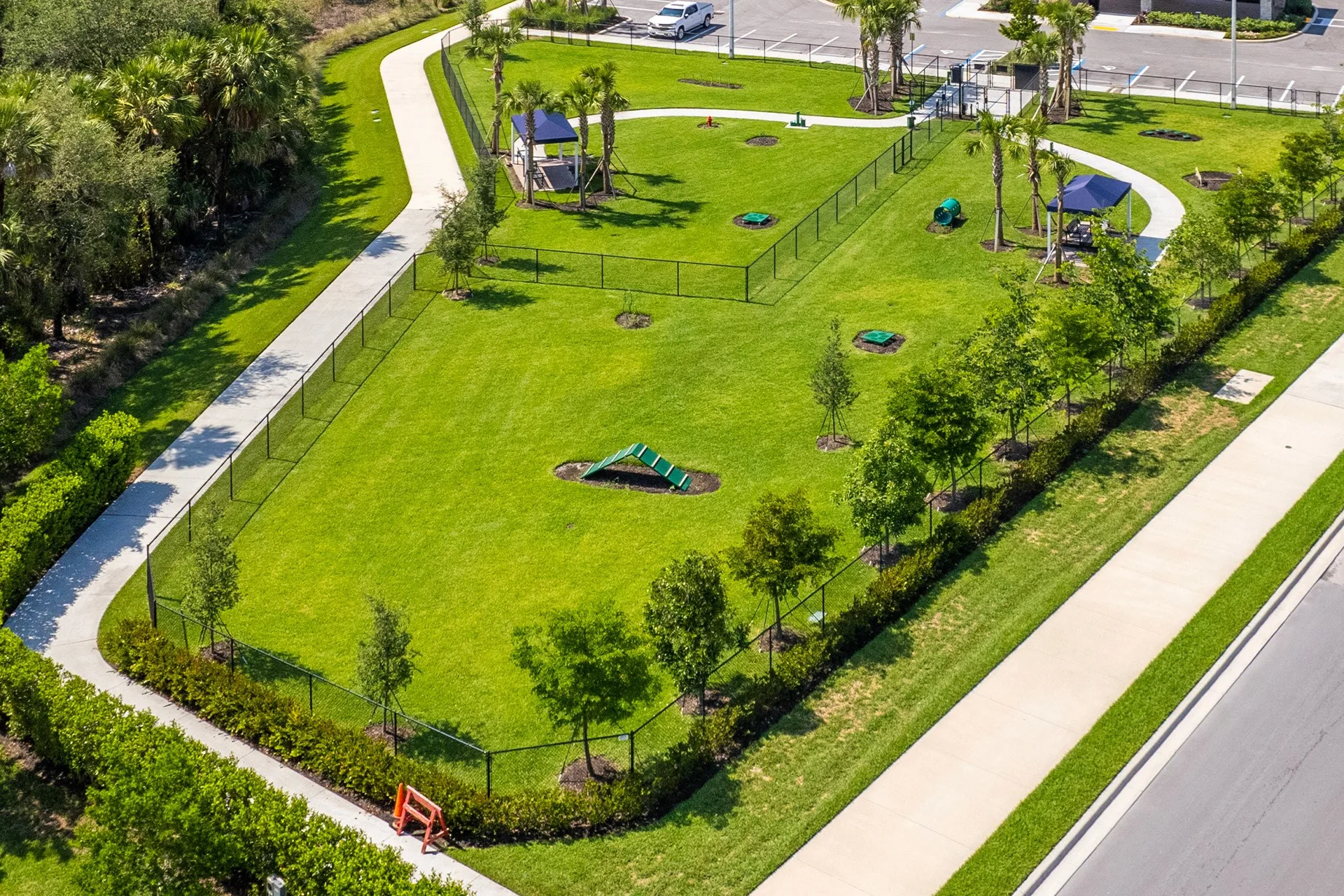 Fenced dog park at Valencia Trails, Naples.