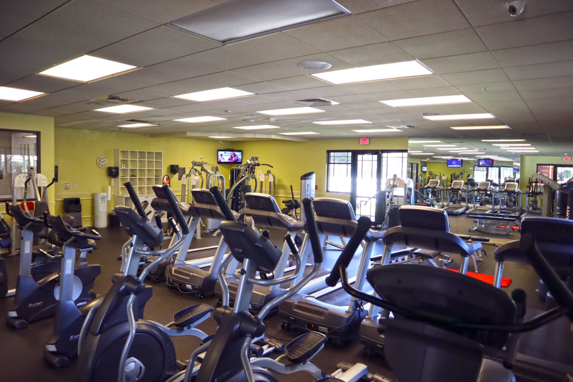 Fitness center cardio room at the Bella Terra clubhouse, Estero (official community site).