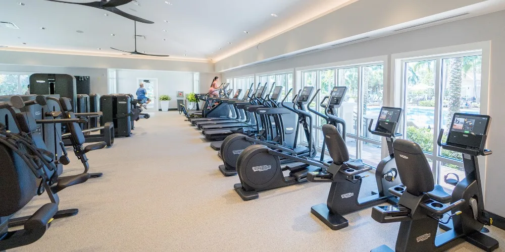 Fitness center at West Bay Club, Estero (official club site).