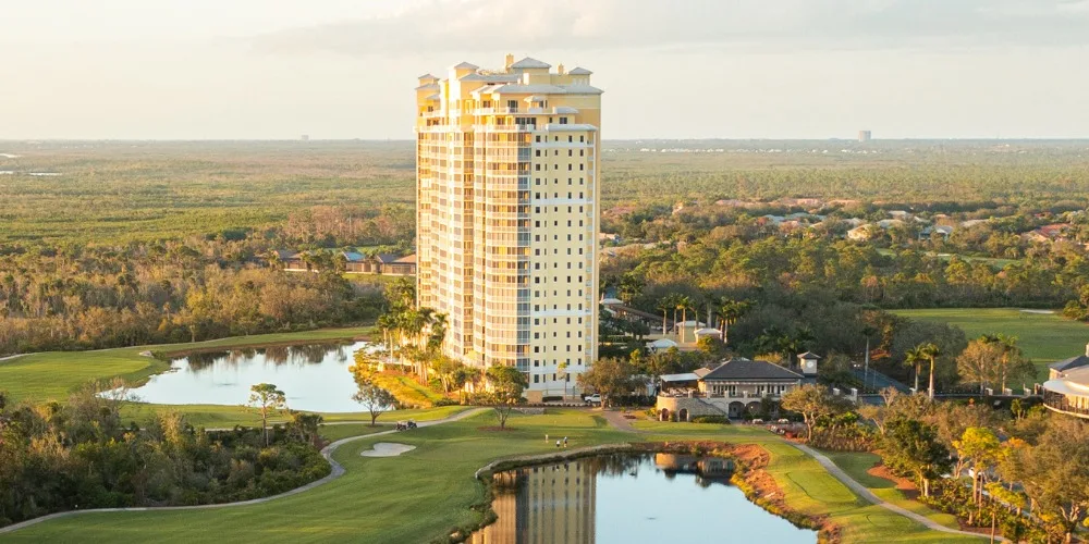 Jasmine Bay tower and golf course at West Bay Club.