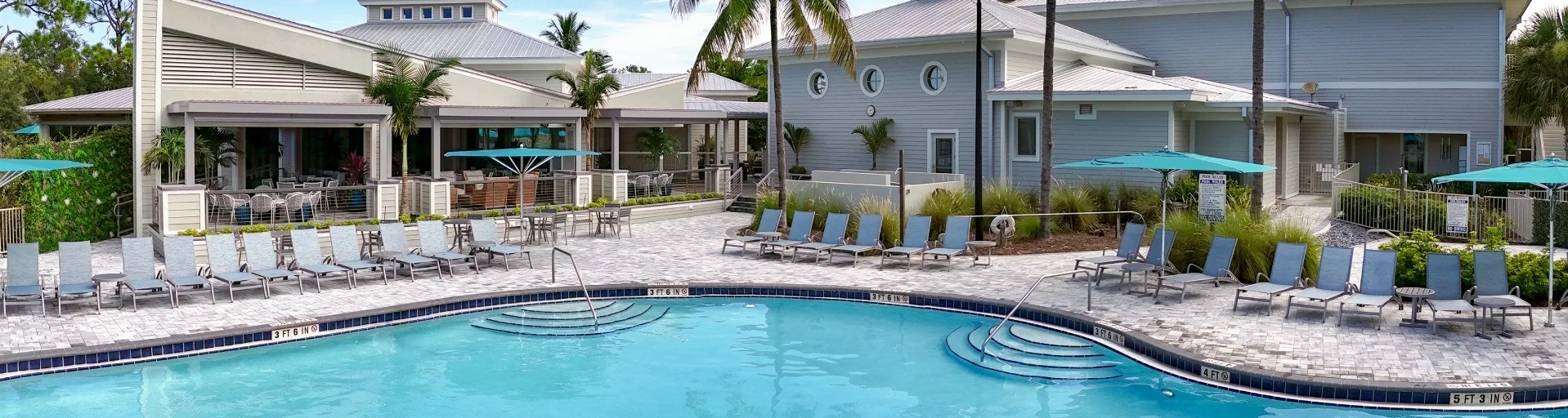 Resort pool at Pelican Sound Golf and River Club, Estero (official club site).