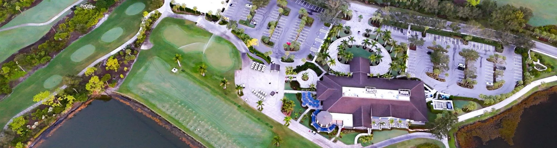 Aerial of the Pelican Sound clubhouse and golf holes (official club site).