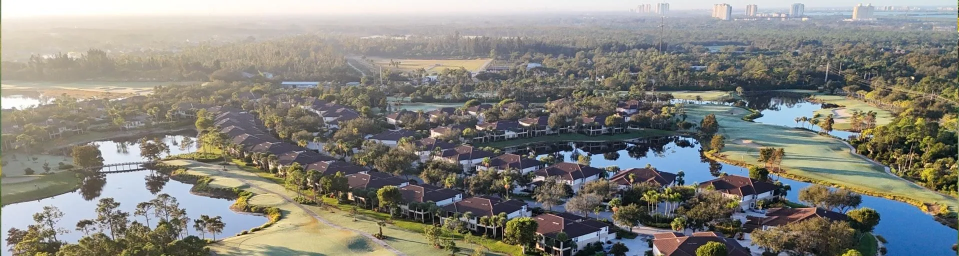 Aerial of Pelican Sound neighborhoods and golf, Estero (official club site).