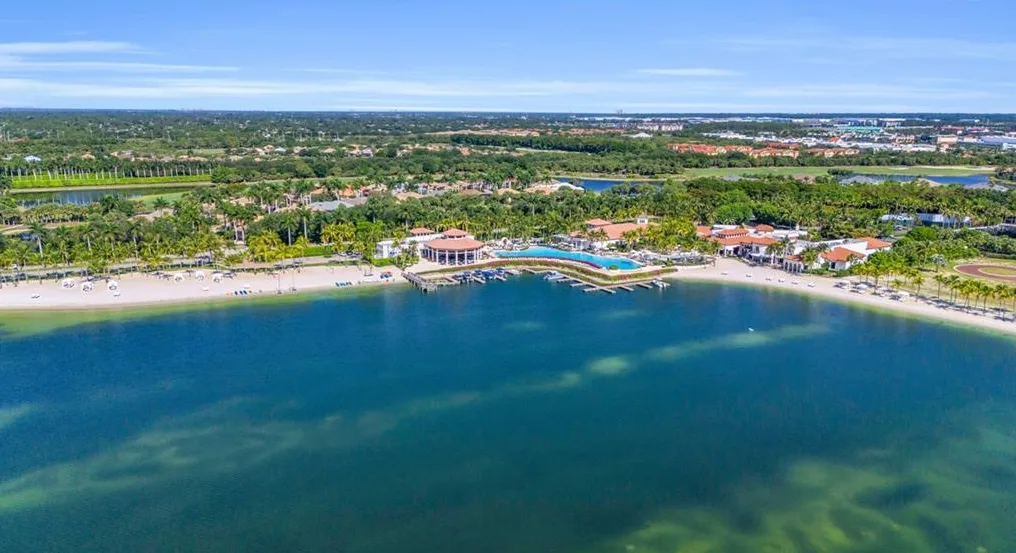 Miromar Lakes aerial of the lake, beach and Beach Clubhouse