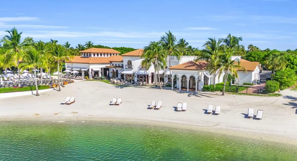 Miromar Lakes Beach Clubhouse from the lake beach