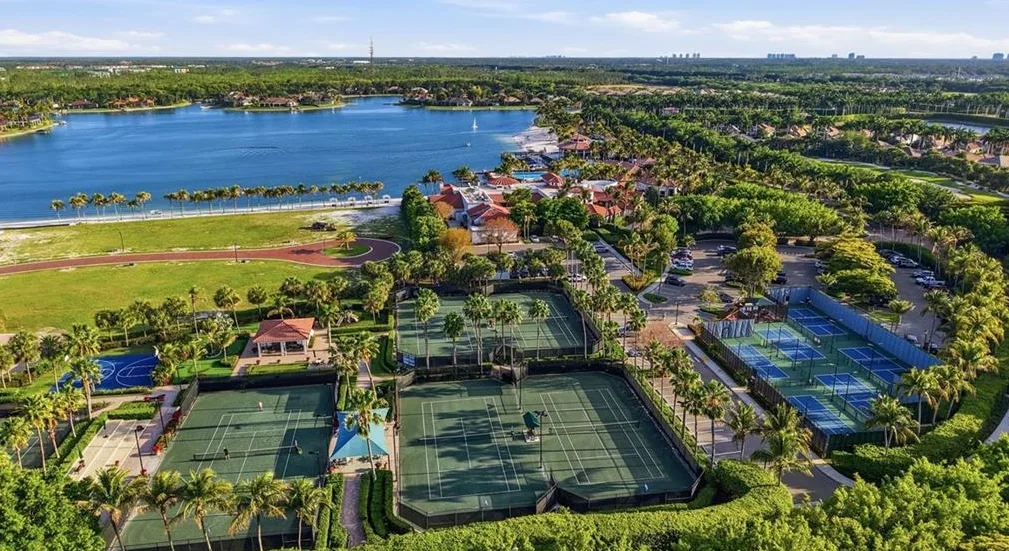 Miromar Lakes racquet club aerial with the lake