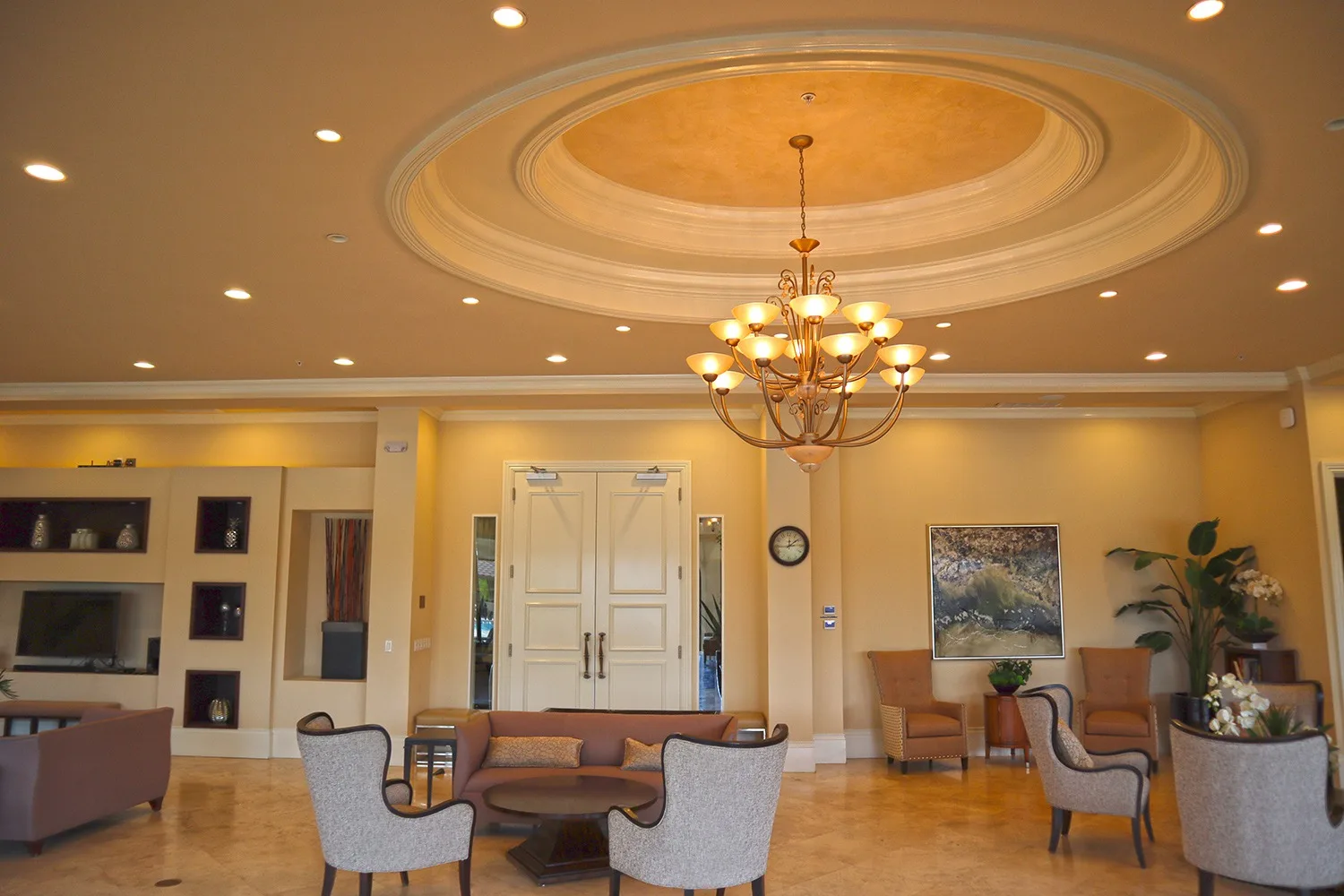 Clubhouse lounge with chandelier at The Preserve at Corkscrew, Estero (official HOA site).