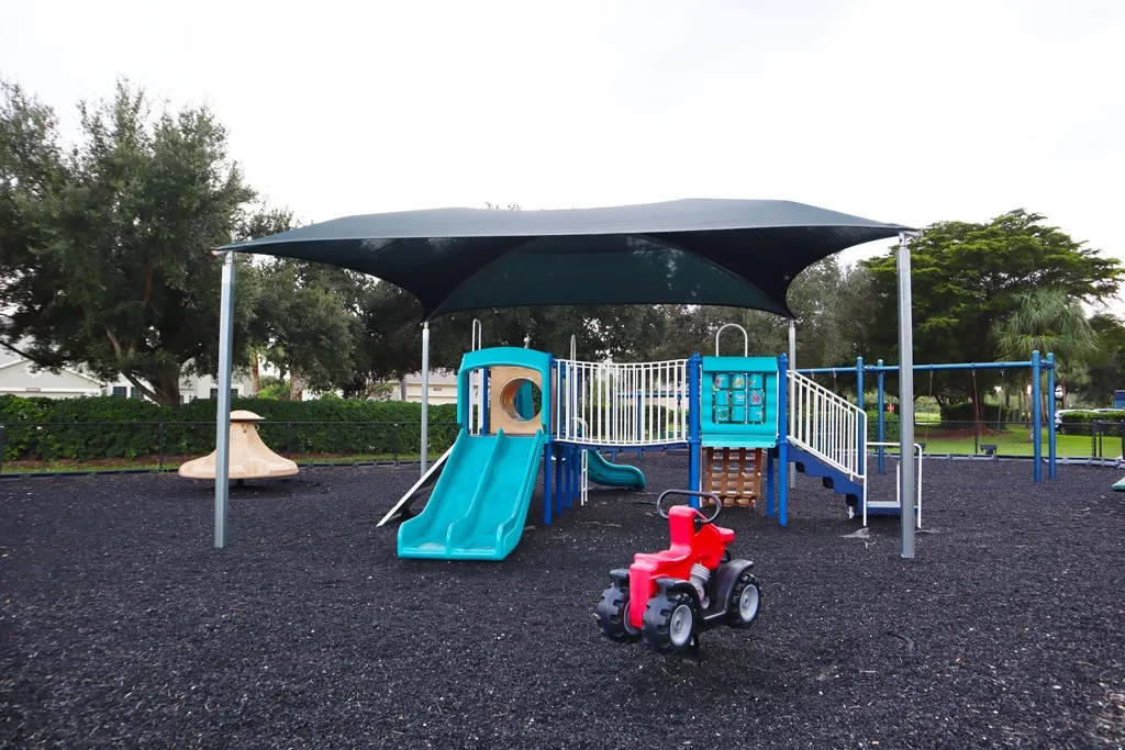 Shaded children's playground at Stoneybrook, Estero (official HOA site).