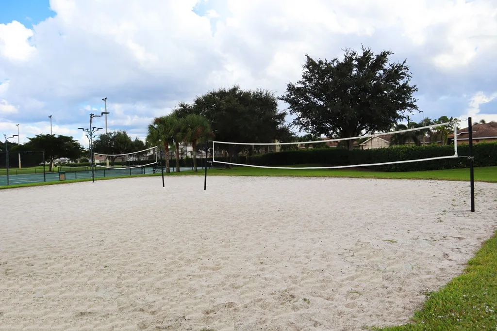 Sand volleyball court at the Stoneybrook amenity center, Estero (official HOA site).