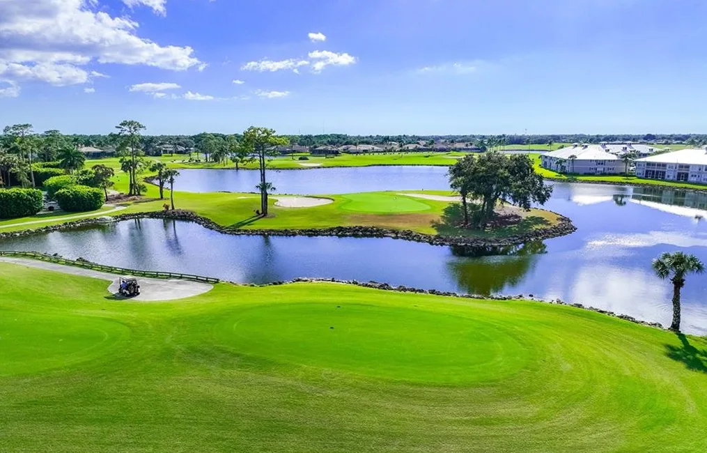 Lely Resort golf course hole over water with lake views