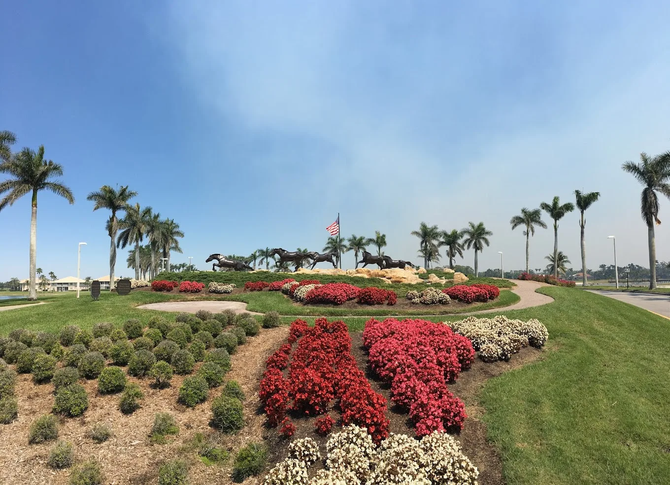 Landscaped grounds and palms at Lely Resort, Naples.