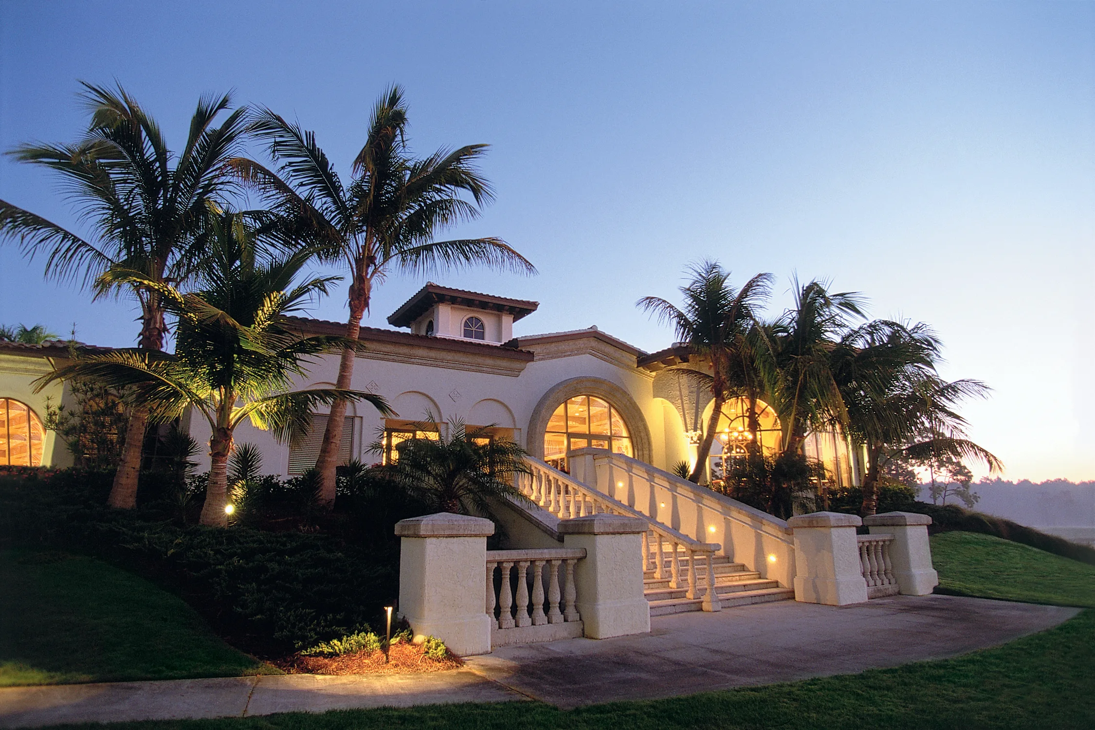 Clubhouse entrance at dusk, Lely Resort Golf and Country Club, Naples.