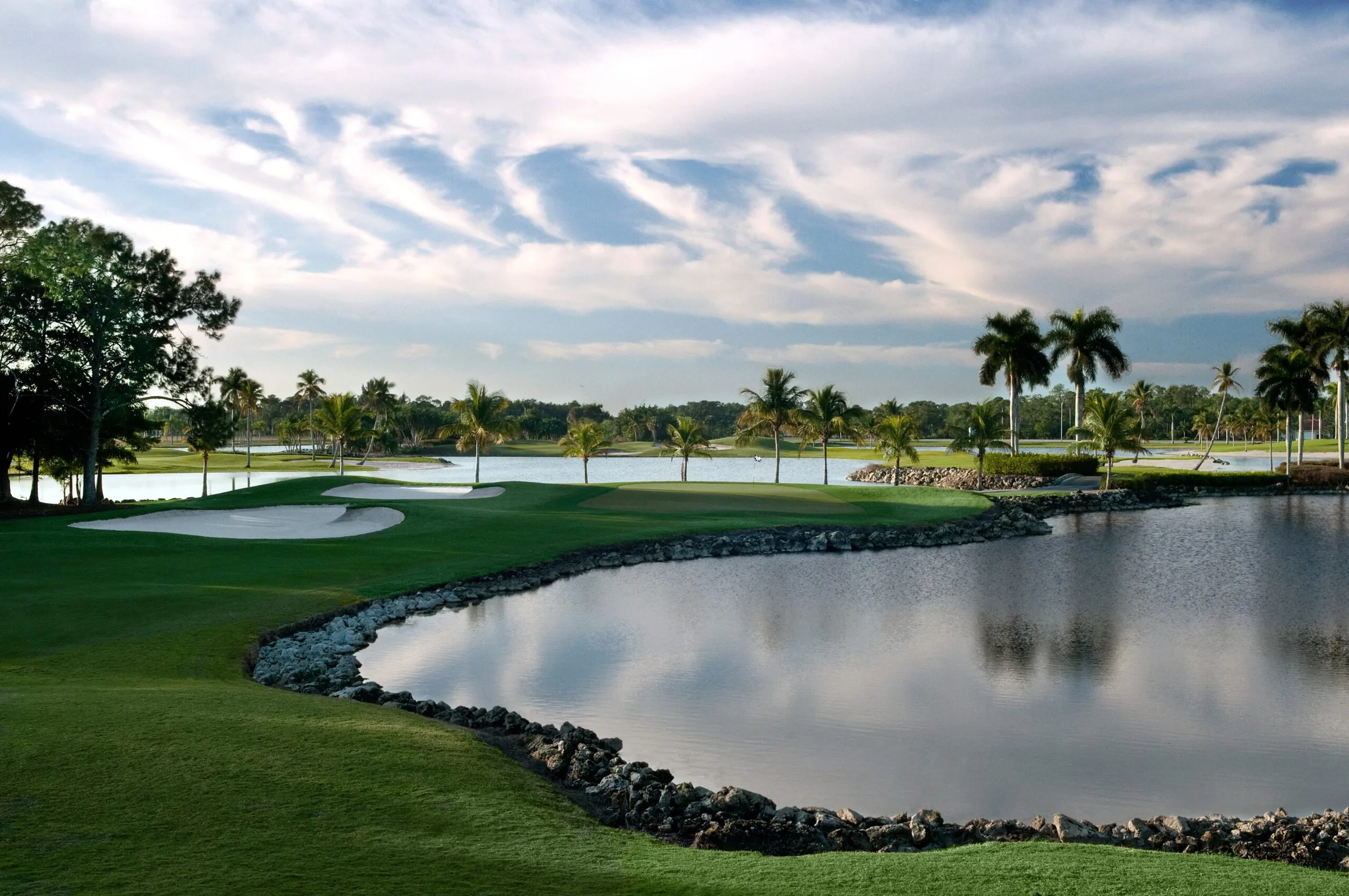 Lake-lined golf hole at Lely Resort Golf and Country Club, Naples.